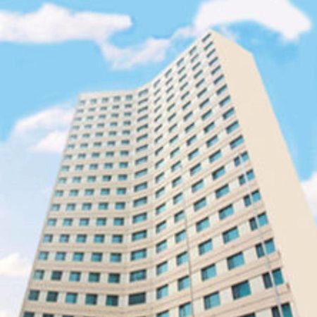 Overseas Chinese International Hotel Циндао Екстериор снимка