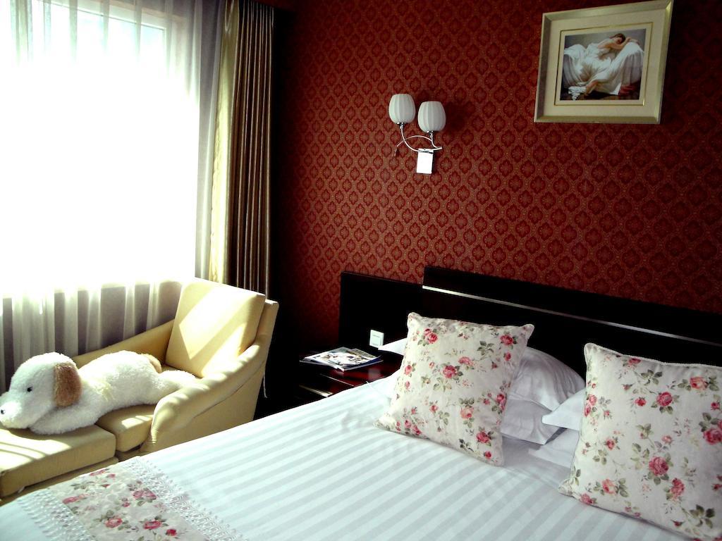 Overseas Chinese International Hotel Циндао Екстериор снимка