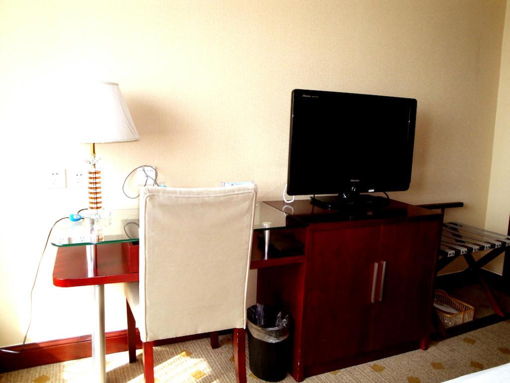 Overseas Chinese International Hotel Циндао Екстериор снимка